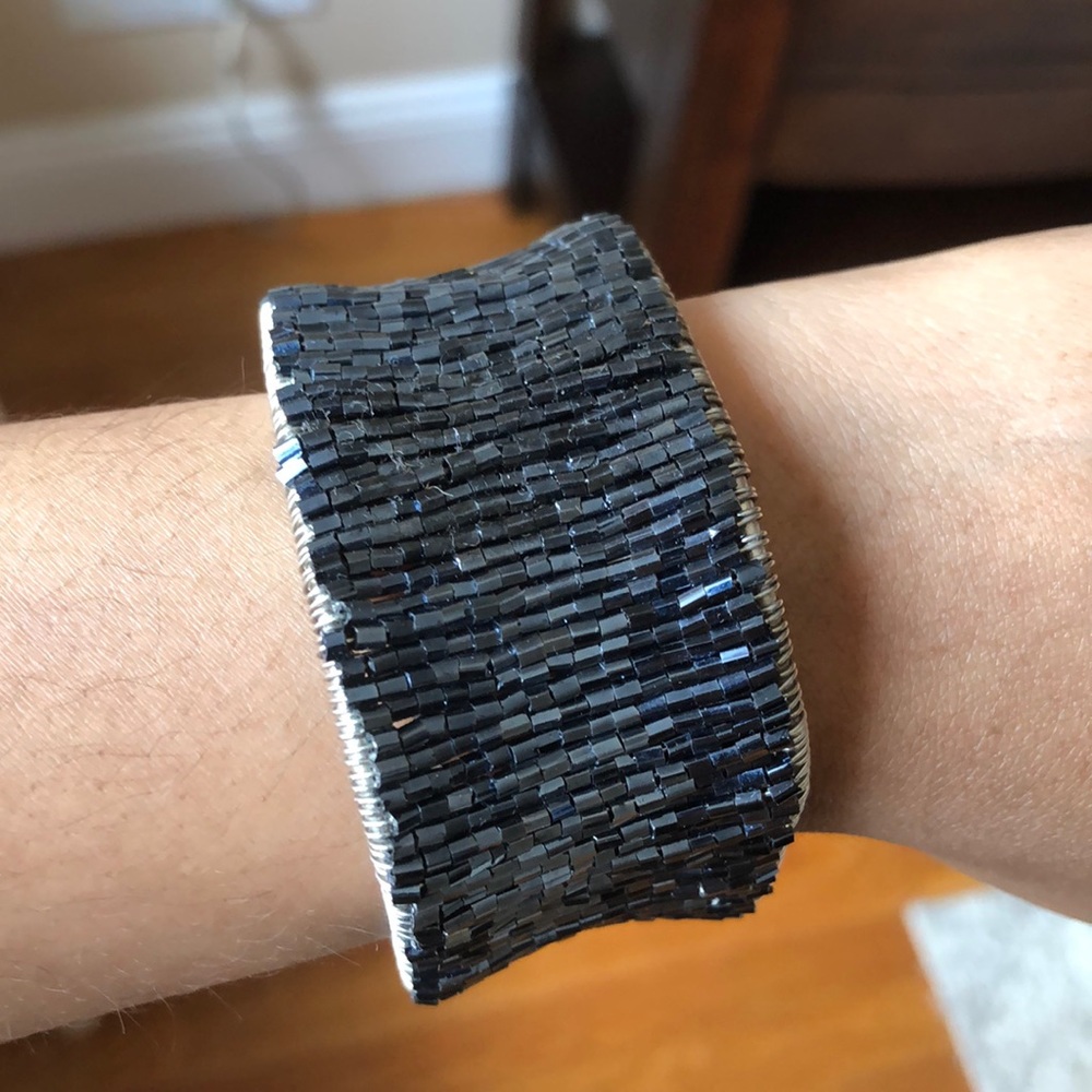 Blue adjustable cuff with silver trim